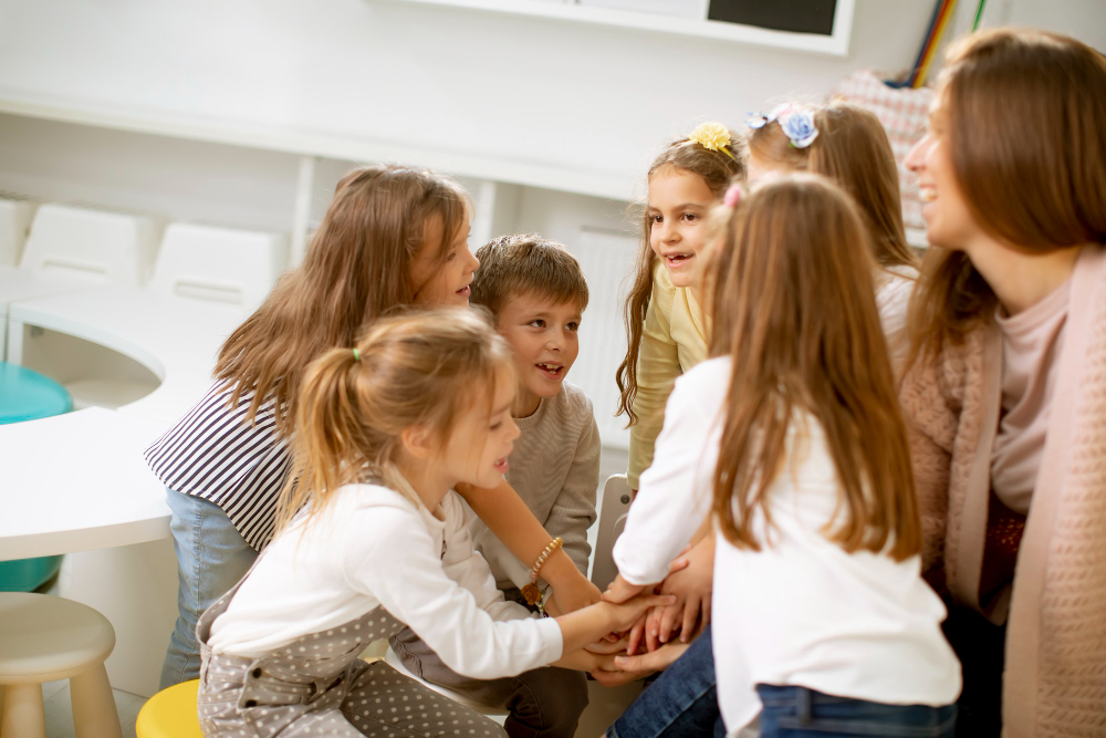 Kringgesprek in de klas over gedragsregels, voor een positief pedagogisch klimaat.
